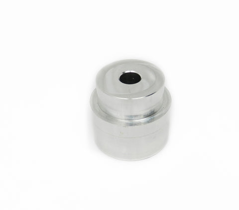 Aluminum Pilot Bearing Adapter for Ford applications about 5 inches in height and 3 inches wide