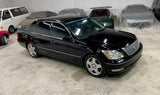 This is a photograph of a black 2005 Lexus LS430