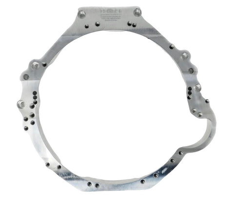 Aluminum adapter plate about 15 inches wide and 2 inches thick for adapting a Ford 5.0 engine to a 350z or 370 z transmission