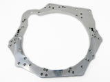 Aluminum adapter plate about 17'' wide and 2'' thick made out of 6061 aircraft aluminum for mating a Honda K24E engine to a KA24DE transmission